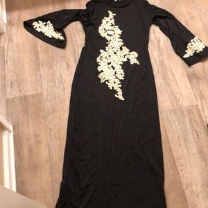 Brand new stylish black dress with gold and pearls